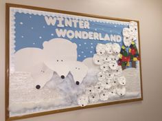 a bulletin board with buttons on it in the shape of animals and snowflakes