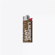 a leopard print flask lighter with red cap