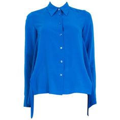 authentic Stella McCartney shirt in cobalt blue silk (100%) with longer a-line side inserts. Has been worn and buttons slightly faded at the dry cleaner. Overall in excellent condition. Tag Size 36 Size XXS Shoulder Width 35cm (13.7in) Bust 94cm (36.7in) Waist 120cm (46.8in) Hips 144cm (56.2in) Length 61cm (23.8in) Side Seam Length 51cm (19.9in) Sleeve Length 60cm (23.4in)