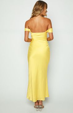 Light Yellow Off Shoulder Formal Dress

How to style:
This maxi dress () screams GLAM in the best way possible! Slip on this stunning number for your next formal () event and be sure to add dainty jewellery () and heels () to complete your look.

Features:
  
 * Light weight satin material 
 * Maxi length 
 * Slight stretch 
 * Bias cut 
 * Off the shoulder style 
 * Fully lined 
 * Invisible zip on left side 
 * Grip on inner bust  

This is the perfect formal dress for your next event! Wedding Guest Dress Yellow, Yellow Satin Prom Dress, Off Shoulder Formal Dress, Formal Maxi Dress, Dainty Jewellery, Prom Midi Dress, Yellow Maxi Dress, Yellow Maxi, Summer Playsuit