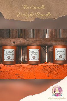 the candle delight bundle includes three small jars with labels on them and an orange background