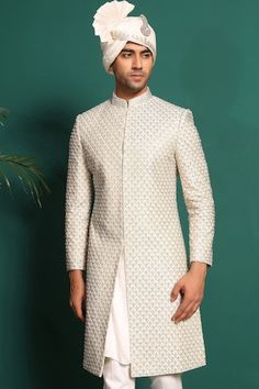 Ivory, white full sleeve sherwani with moti, cutdana embellishment in checkered pattern. Paired with kurta and pant. - Aza Fashions Designer White Sherwani For Designer Wear, Designer White Sherwani With Cutdana, Eid Sherwani With Pearl Embroidery, Pearl Embroidered Long Sleeve Sherwani For Eid, Designer Bandhgala With Pearl Embroidery And Long Sleeves, Designer Long Sleeve Bandhgala With Pearl Embroidery, Festive Long Sleeve Sherwani With Pearl Embroidery, Designer White Sherwani With Long Sleeves, White Long Sleeve Bandhgala With Pearl Embroidery