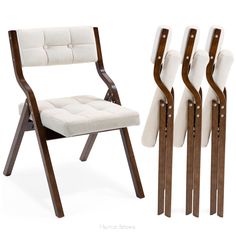 a set of four chairs with wooden legs and white fabric upholstered backrests