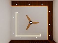 a ceiling fan mounted to the side of a wall