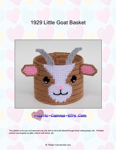 a small basket with a cow face on the front and side, it has hearts in the background