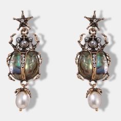 New! Egyptian Scarab Beetle Earrings Pearl Abalone Shell Gold Stone Embellished Decor Drop Rhinestones New In Box Excellent Condition- No Visible Flaws Vintage Vibe Shines Stunning In The Sun Mystique & Playful Stars Tiny Skull Heads Questions? Leave A Comment Below! Other Listings: Boho Bohemian, Anthropologie, Free People, Johnny Was, Antique, Ancient, Zara, Gypsy, Breeze, Beachy, Indie Rockabilly, Comfortable, Lightweight, Feminine, Flirty, Modern, Cute, Chick, Romantic Summer Vacation, Trend Egyptian Scarab Beetle, Beetle Earrings, Vintage Vacation, Egyptian Scarab, Earrings Classic, Scarab Beetle, Hot Miami Styles, Love Culture, Anthropologie Jewelry