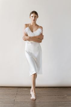 Our new collection of pure silk slip dresses featured with feather is absolutely amazing and exclusive! This long white 90s Slip Dress made of pure mulberry silk is for refined, romantic women. A V-neckline with feather and adjustable spaghetti straps meet a bias cut to fall beautifully against the body, inspiring a feminine silhouette. Effortless for both day and night, for romantic evening or as a bridal party dress. - Our model wears size S, her measurements are 86/65/94 cm and she is 178 cm V-neck Slip Dress With Delicate Straps For Wedding, Satin Wedding Dress With Delicate Straps, Wedding Dresses With Delicate Straps In Satin, Silk V-neck Slip Dress For Wedding, Silk Camisole Dress For Wedding Night, Summer Wedding Night Dress With Bias Cut, Delicate Satin Wedding Dress, Feminine V-neck Slip Dress For Wedding, Elegant Silk Wedding Dress With Spaghetti Straps