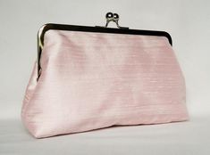 Blush Pink Silk Clutch, Blush Pink Wedding Clutch, Brides Clutch, Bridesmaid Clutch, Evening Clutch, Bridesmaids Gifts,Blush Bridesmaids Set #PinkBridalBag #HandcraftedUk #ClutchPurse #BridesmaidsClutch #KissLockClasp #PinkBridesmaids #BridesmaidsGift #EveningClutch #theheartlabel #weddings Handmade Clutch Purse, Dupioni Silk Fabric, Bridesmaid Clutch, Blush Pink Wedding, Silk Clutch, Bridesmaid Clutches, Blush Bridesmaids, Wedding Bags, Floral Clutches