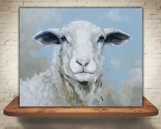 a painting of a sheep on a shelf