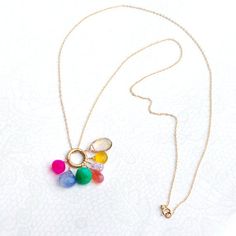 This gemstone necklace created by Jewelry by Carmal is made of a pink, yellow, periwinkle, grapefruit chalcedony, purple cz, ametrine and chrysoprase gemstones, 14K gold filled: chain, spring ring clasp and findings. This necklace measures 24 inches in length. Create a mother's necklace by selecting birthstones for you and your siblings! All of our jewelry arrives wrapped and ready for gift giving. We offer free standard shipping, via USPS, within the United States. Purple Multi-stone Necklace For Gift, Purple Multi-stone Necklace Gift, Multicolor Birthstone Pendant Necklace, Elegant Multicolor Birthday Necklace, Pink Multi-stone Necklaces For Gifts, Pink Multi-stone Necklace As Gift, Pink Multi-stone Necklace For Gift, Mothers Necklace, Fine Jewellery