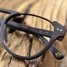 Enhance your style and make a bold fashion statement with the Hdcrafter Unisex Full Rim Round Double Bridge Metal Wood Frame Eyeglasses PS5056. Designed with a unique fusion of metal and wood materials, these eyeglasses are the perfect blend of modern and classic style. The round shape of the frames and the double bridge detailing add a touch of sophistication to your look. With a lens width of 53mm and a lenses height of 46mm, these eyeglasses will provide you with optimal vision and clarity. C Adjustable Round Frame Glass Sunglasses, Modern Glass Sunglasses As Gift, Stylish Glasses For Men, Suede Jacket Men, Mens Glasses Fashion, Frame Eyeglasses, Smart Glasses, Clip On Sunglasses, Street Style Outfits Men