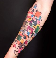 a person with a colorful tattoo on their arm