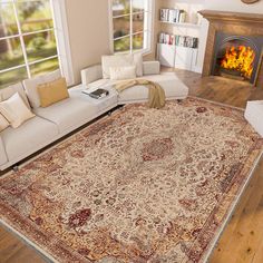 a living room filled with furniture and a large rug on top of a hard wood floor