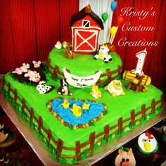 a birthday cake decorated with farm animals and farm scenes