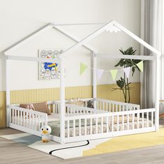 a child's bedroom with a white bed and yellow walls