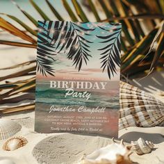 a birthday party on the beach with seashells and palm trees in the background