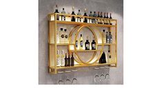 a wall mounted wine rack filled with bottles and glasses