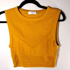 Excellent Condition No Flaws Noted. Measures 14 Inches Armpit To Armpit And 15 Inches Long. Yellow Cropped Tank Top For Spring, Cropped Yellow Tank Top For Spring, Mustard Fitted Sleeveless Top, Fitted Mustard Sleeveless Top, Mustard Sleeveless Tank Top For Summer, Stretch Yellow Knit Top, Yellow Cropped Stretch Tops, Yellow Stretch Cropped Tank Top, Summer Yellow Knit Top