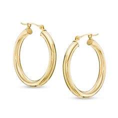 Big on style, these hoop earrings are a great go-with-everything look. Crafted in warm 14K gold, each earring measures 3.0 x 25.0mm. Polished to a bright shine, these earrings secure with latch backs. Small Hoop Yellow Gold Classic Earrings, Classic Small Hoop Earrings In Yellow Gold, Timeless Hypoallergenic Hoop Earrings, Timeless Hoop Earrings For Anniversary, Formal Yellow Gold Hoop Earrings With Ear Wire, Yellow Gold Oval Hoop Earrings With Ear Wire, Classic Hoop Earrings For Anniversary, Yellow Gold Hoop Earrings With Lever Back, Classic Yellow Gold Hoop Earrings For Anniversary