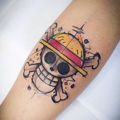 a skull with a hat and crossbones on it's arm is shown