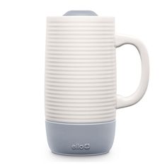 a white and grey coffee mug with handles