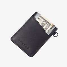 Our patented Vertical Wallet is a slim leather wallet equipped with our signature elastic pocket, which not only fits tightly around your cards but also gives the wallet a unique style. This Thread® wallet features RFID-secure technology to protect your credit card information. Versatile Rfid Blocking Card Holder For Daily Use, Versatile Trifold Wallet With Rfid Blocking For Business, Versatile Business Trifold Wallet With Rfid Blocking, Versatile Everyday Card Holder With Rfid Blocking, Functional Card Holder With Hidden Phone Sleeve, Modern Rfid Blocking Card Holder For Daily Use, Modern Card Holder With Id Window For Everyday Use, Modern Bifold Card Holder With Hidden Phone Sleeve, Modern Bifold Card Holder With Phone Sleeve