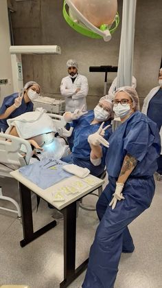 doctors performing surgery in an operating room