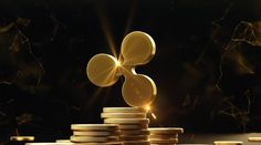 a stack of gold coins sitting on top of each other in front of a black background