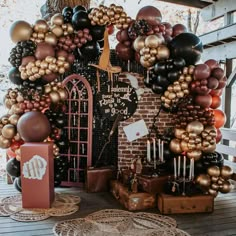 a bunch of balloons that are on top of a table