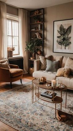 a living room filled with furniture and a large rug on top of a wooden floor