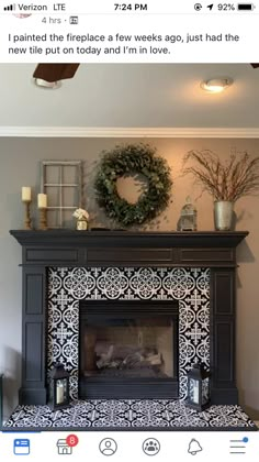 a fireplace with a wreath on top of it