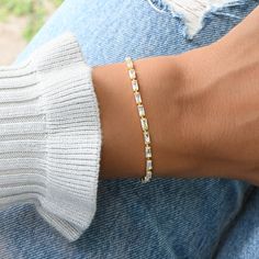 "Super chic bracelet, that is beautiful and minimalist. Adds a nice touch of sparkle, while still being classy! - - D E T A I L S - - ▪︎ We use a Thick plating of 14k Gold or Rhodium over Brass ▪︎ Measures 6.5\" + 0.5\" Extension Chain ▪︎ 2.4mm wide, Each baguette measures 2x5mm ▪︎ Lobster Clasp Closure ▪︎ Nickel-free, lead free and hypoallergenic ▪︎ Highest Grade CZ for an authentic diamond look Made with 100% Pure Love ♡ Ships in a white gift box, ready for gift giving!" Tennis Bracelet Gold, Baguette Bracelet, Gold Tennis Bracelet, Bracelet Tennis, Bracelet Diamond, Chic Bracelet, Precious Jewels, Jewelry Lookbook, Minimalist Bracelet