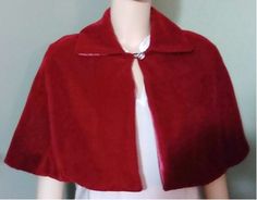 our handmade classic red velvet capelet is a lovely bridal capelet. This elegant handmade red velvet capelet measures 18.5 inches from neckline to hemline. The entire red velvet bridal capelet is lined with a soft red satin lining. Our red velvet capelet closes at the neckline with an elegant crystal button. Size chart:   Size Small   8-10     Bust Size 32-34   Size Med.     12-14   Bust Size 34-37  Size Large     16-18   Bust Size  38--40  Size Xlarge     20-22  Bust Size  40-42 Kindly state yo Red Riding Hood Cosplay, Winter Wedding Red, Wedding Capelet, Bridal Capelet, Wedding Cloak, Junior Bridesmaids, Velvet Cape, Wedding Shrug, Womens Poncho