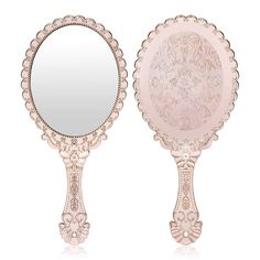 an ornately decorated mirror is shown against a white background with the reflection in it