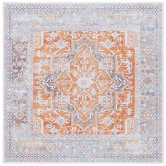 an orange and blue area rug with ornate designs on the center, in front of a white background