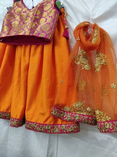 Product: Custom made girls kids dress. Size : All sizes possible. Price listed for dress for kids up to age 1-4 years. Additional $10 for age 4-8 years. Additional $20 for age 8-12 years. Fabric: Lehenga- Soft silk Top - banarasi Dupatta - embroidered net Delivery Time : Please let me Know if you are ordering for any special dates kindly inform me for any dates or times frame you keeping in mind. Chanderi Sharara For Festivals, Diwali Designer Wear Salwar Kameez, Pink Saree Skirt Set For Diwali, Anarkali Skirt Set For Festivals, Designer Wear Dupatta For Diwali, Designer Wear Skirt Set With Dupatta For Diwali, Anarkali Skirt Set With Self Design For Festivals, Orange Choli With Sheer Dupatta For Eid, Orange Choli With Sheer Dupatta For Festivals