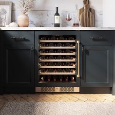 a wine cooler in the middle of a kitchen