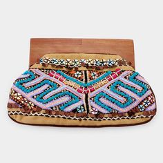 Style No : [430156] Fsb500-Mt Color : Multi Theme : Wood Size : 13" X 8.25" One Small Interior Inside Pocket One Inside Zipper Pocket Wood Clasp Closure Made In India Boho Embroidered Beaded Wood Handle Clutch Bag Bohemian Beaded Clutch, Embellished Multicolor Summer Shoulder Bag, Embellished Multicolor Shoulder Bag For Summer, Bohemian Multicolor Embellished Clutch, Traditional Summer Party Bags, Brown Embroidered Clutch Bag, Beaded Multicolor Embroidered Rectangular Shoulder Bag, Multicolor Embroidered Beaded Rectangular Shoulder Bag, Bohemian Handheld Embellished Bag