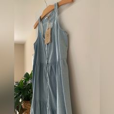 Nwt! Light Weight Tiered Chambray Dress By True Craft. Full Button Front With Extra Button Attached To Tag. Racerback. Falls Above Knee. Size Medium. Perfect New Condition. Casual Cotton Maxi Dress With Button Closure, Sleeveless Button Closure Summer Maxi Dress, Sleeveless Summer Maxi Dress With Button Closure, Sleeveless Maxi Dress With Buttons For Brunch, Cotton Midi Dress With Button Closure For Beach, Cotton Maxi Dress With Button Closure For Beach, Summer Button-up Cotton Midi Dress, Cotton Maxi Dress With Button Closure For Day Out, Light Wash Buttoned Midi Dress