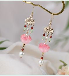 Bohemian Festive Drop Flower Earrings, Bohemian Flower Drop Earrings For Festive Occasions, Bohemian Drop Flower Earrings For Festive Occasions, Traditional Flower-shaped Earrings For Festivals, Traditional Flower Earrings For Festival, Traditional Flower Shaped Earrings For Festivals, Traditional Dangle Tassel Earrings For Summer, Festival Gift Tassel Dangle Earrings, Traditional Pink Flower Earrings