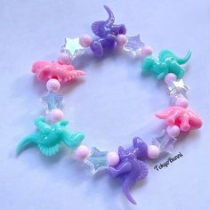 Pastel Dino Bead Bracelet! 🦕🦖 -Made to fit a 6.5 to 7 inch wrist -If you have an question please message me! -I can do custom orders! Kawaii Bracelet, Kandi Bracelets, 5 To 7, Bead Bracelet, Dinosaurs, Custom Orders, Jewelry Bracelets, Accessory Gift, Beaded Bracelets