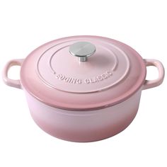 a pink casserole dish with a lid and handle is shown on a white background