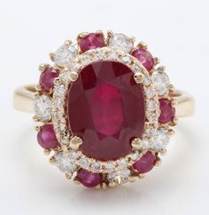 4.90 Carat Natural Red Ruby and Diamond Women Ring Made in 14K Solid Yellow Gold Suggested Retail Price $5,999.00 Total Natural Ruby Weight is - 3.90 Carat Ruby Measurements are - 10.00 x 8.00 mm Total Diamonds Carat Weight is - 1.00 Carat Clarity: SI1 Color: G-H Diamond Cut - Very Good RING SIZE: 6 (FREE SIZING AVAILABLE) RING WEIGHT IS 4.5 gram Disclaimer: All colors, measurements and weights are approximate and may vary slightly from the listed dimensions or as seen in the image'' Gold Women Ring, Ruby Diamond Engagement Ring, Promise Ring Gift, Ruby Engagement Ring, Art Deco Engagement, Silver Wedding Rings, Deco Engagement Ring, Solid Gold Rings, Rings Cool