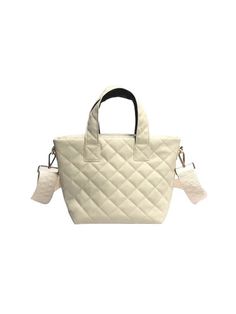 Vanilla quilted vegan leather This puffer compact zip top tote goes from day to night with its streamline design Lined interior with zip pocket and removable wristlet pouch Top handles and removable crossbody strap. Dimensions- 11 inches wide x 8.5 inches tall x 5.5 inches deep Made in China White Quilted Top Handle Bag, Chic Cream Quilted Shoulder Bag, Quilted Top Handle Shoulder Bag For Shopping, Cream Quilted Travel Bag, Cream Quilted Shoulder Bag For Everyday Use, Everyday Quilted Cream Shoulder Bag, Everyday Cream Quilted Shoulder Bag, Quilted Double Handle Shoulder Bag, Quilted Leather Shoulder Bag For On-the-go