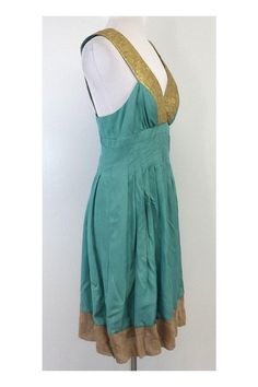 Size 8 Teal & Gold Dress Self/lining 100% silk Made in USA Sleeveless Surplice neckline V-back Padded bust Floral embroidered gold Tan hem Pleated skirt Concealed side zip & hook Shoulder to hem 39.5" Gold Sleeveless Silk Dress, Gold Silk Sleeveless Dress, Fitted Green Silk V-neck Dress, Gold A-line Silk Dress, Gold Silk A-line Dress, Summer Fitted A-line Silk Dress, Fitted A-line Silk Summer Dress, Gold Silk Dress, Gold Silk