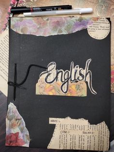 an old book with the word english written in cursive writing and torn paper