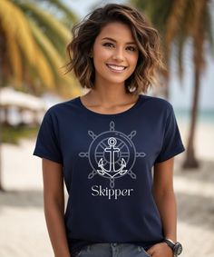 This Skipper nautical tshirt for men and women will look so nice on the deck of that cruise ship! Family vacay tee in several colors for you to choose from. This classic unisex jersey short sleeve tee fits like a well-loved favorite. Soft cotton and quality print make users fall in love with it over and over again. These t-shirts have-ribbed knit collars to bolster shaping. The shoulders are tapered for a better fit over time. Dual side seams hold the garment's shape for longer.  .: Made with 10 Blue Nautical Style T-shirt For Summer, Navy Summer T-shirt, Nautical Style Summer T-shirt With Letter Print, Nautical Letter Print T-shirt For Summer, Nautical Style Letter Print T-shirt For Summer, Nautical Style Graphic Print Tops For Summer, Nautical Blue T-shirt For Summer, Blue Nautical T-shirt For Summer, Anchor Shirts