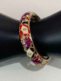 This is a gorgeous vintage Jiu Long Xing enamel clamper bracelet. Shiny Cloisonne fuchsia , cream, red, enamel with crystals accent, floral hinged design, happy colors! Excellent vintage condition, light signs of wear inside!  PLEASE look at ALL pictures for measurements and condition as they are a very important part of the description, and what you will receive! Pictures are made with different light! Please note that this is sold "As Is", no returns please! The Link to my shop is: https://www Luxury Enamel Bracelet Jewelry, Red Enamel Bangle Jewelry, Elegant Multicolor Enamel Bangle, Red Enamel Bangle, Shopping Link, Bracelet Summer, Floral Jewelry, 2000s Fashion Outfits, Jewelry Lookbook