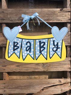 a wooden sign that says baby on it