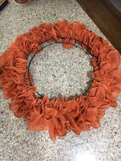 a close up of a wreath on a counter